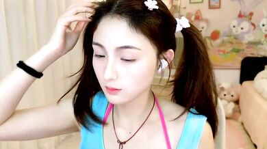 Naughty young Asian brunettes show off their dirty talk in steamy stripchat video