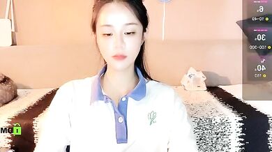 Watch as Asian babe strips, teases, and gives a steamy big-ass-young blowjob in a strip show