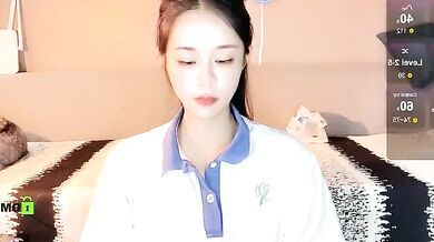 Watch as Asian babe strips, teases, and gives a steamy big-ass-young blowjob in a strip show