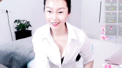 Watch Paopao-a, the sexy Chinese MILF, give a kinky public BJ and get off with a finger in her wet pussy