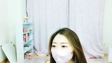 Watch as young Asian cam girls give an erotic striptease & blowjob to each other in wild cam show