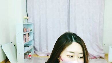 Watch as young Asian cam girls give an erotic striptease & blowjob to each other in wild cam show