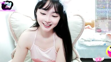 Watch Hot-nini20, the petite-asian slut, talk dirty and squirt in cam2cam action