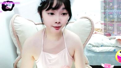 Watch Hot-nini20, the petite-asian slut, talk dirty and squirt in cam2cam action