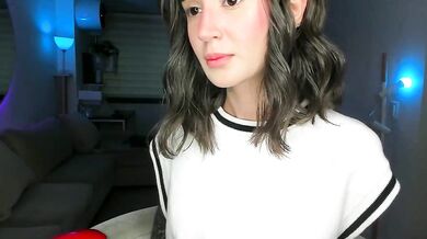 Lonely_lolly98: Mesmerizing temptress captures herself on webcam