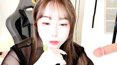 Alano-01's young Asian girlfriend gets her big ass and tits titty-fucked in a hot striptease