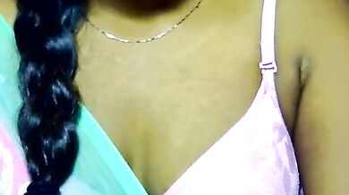 Petite Indian teen strips, shows off her hairy pussy, and squirts while getting doggy-styled