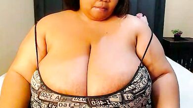Watch XXSEXYBBW94's oil-drenched striptease and get naughty with her toys