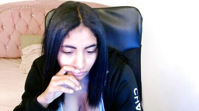 Shaneelle's petite Latina body takes a huge facial after a hot titty-fuck on cam