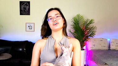 Petite Asian cam girl VinaSky gets oiled up & spanked in POV foot fetish video