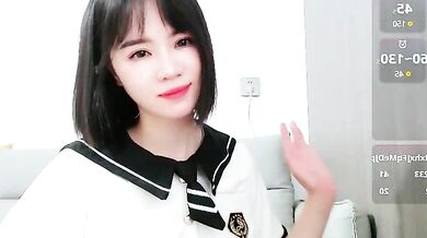 Watch as this hot Asian cam girl gives a kinky footjob and gets a messy creampie from her mistresses