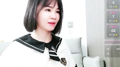 Watch as this hot Asian cam girl gives a kinky footjob and gets a messy creampie from her mistresses