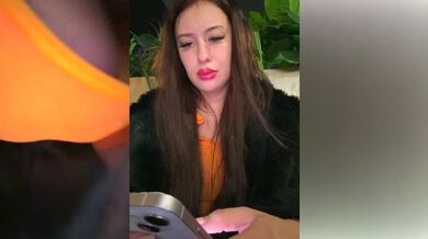 AndreaMood's big tits and hairy pussy get fingered in a public place