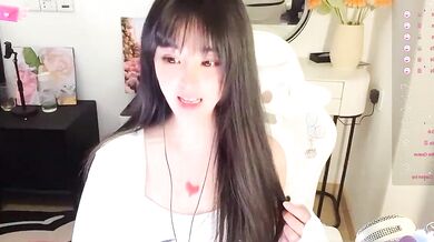 Milla-z oils up and gives a romantic Asian blowjob on cam