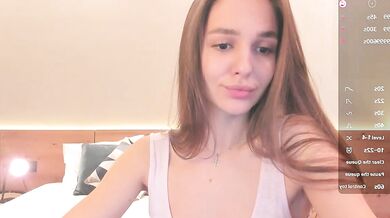 JudyAngil's oil-drenched young ass gets spanked and dildo-fucked in a hot, cheap anal video