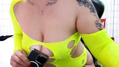 Watch Nina's big tits bounce as she pleasures herself with a vibrator in her ass and heels