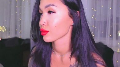 LinaMuhn's role-play as a young Asian handjob mistress & dirty talker in record-breaking anal sex tape