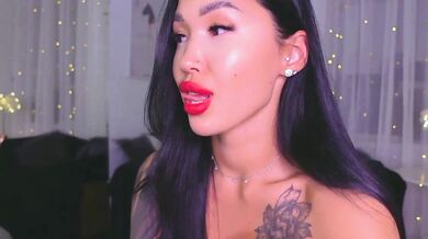 LinaMuhn's role-play as a young Asian handjob mistress & dirty talker in record-breaking anal sex tape