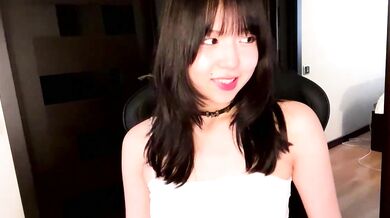 Melana Love shows off her oiled-up Asian body and gives an unforgettable handjob on cam