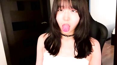 Melana Love shows off her oiled-up Asian body and gives an unforgettable handjob on cam