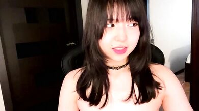 Melana Love shows off her oiled-up Asian body and gives an unforgettable handjob on cam