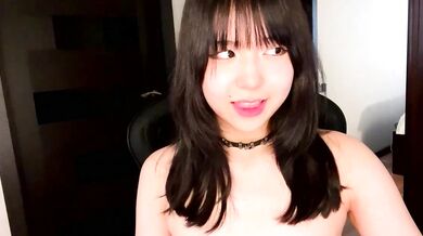 Melana Love shows off her oiled-up Asian body and gives an unforgettable handjob on cam