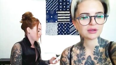 Young UK models get frisky with each other while showing off their tattoos and feet