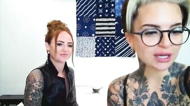 Young UK models get frisky with each other while showing off their tattoos and feet