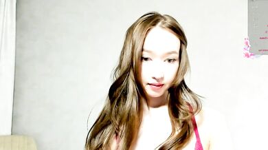 Watch petite Asian brunette Luna022 strip, tease, and squirt while getting oiled up for a public striptease