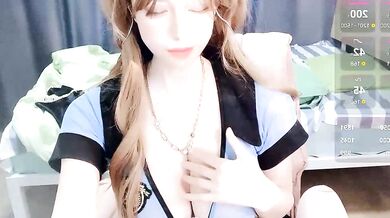 Naughty Asian babe Lei-er strips & teases with her tight pussy in office