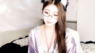 Petite office babe indulges in dirty talk and kinky toy play with her chinese lover