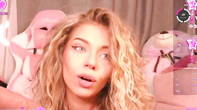 Watch Maddisonblush, the petite blonde, play with a big clit and get off with a latex toy