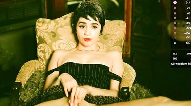 Watch J_O_A_N's mesmerizing moans as she surrenders to pleasure and ecstasy