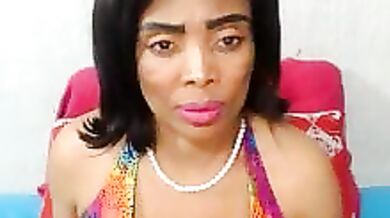 Watch LollaMoans finger and blow her ebony pussy & take a big facial